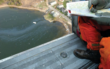 An oil spill visible from a helicopter.