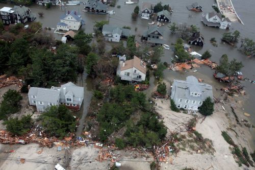 Image of damaged coastal homes in the wake of Hurricane Sandy.