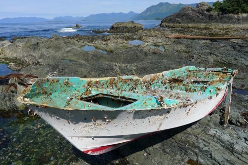 Image of small boat inscribed with Japanese characters found on coast.