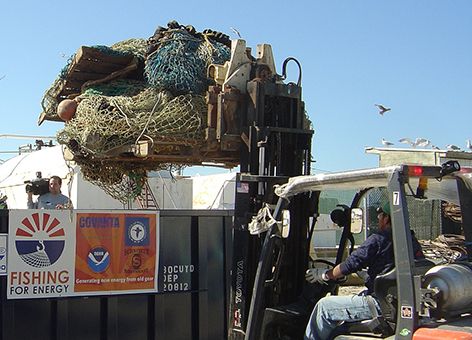 Disposing of derelict fishing gear in a Fishing for Energy bin.