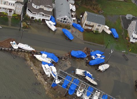 Boats were displaced and houses flooded in Brigantine, N.J., after Sandy in 2012