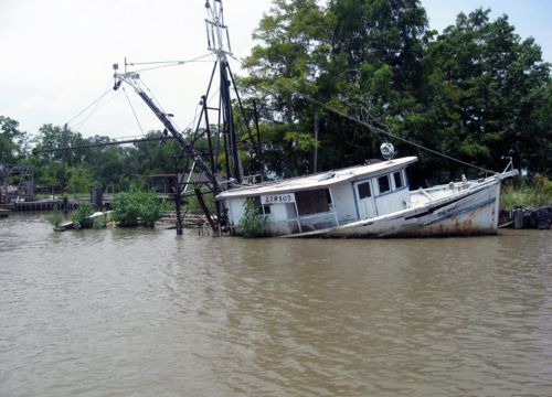 Boat half-sunk in Vermilion Bay, Lousiana.