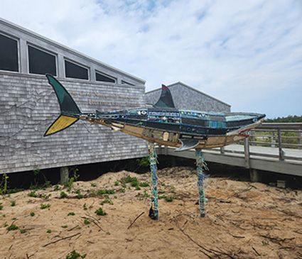 A sculpture of an Atlantic White Shark made out of marine debris collected from Seashore beaches.