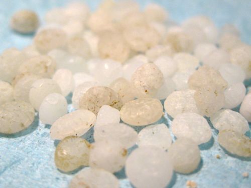 A closeup image of pre-production plastic pellets.
