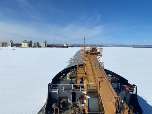 An icebreaker going through ice.