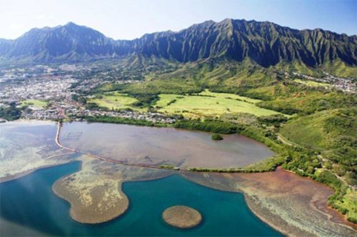 Hawaii coastline with mountains.