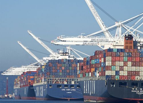 Large ships with cargo containers.