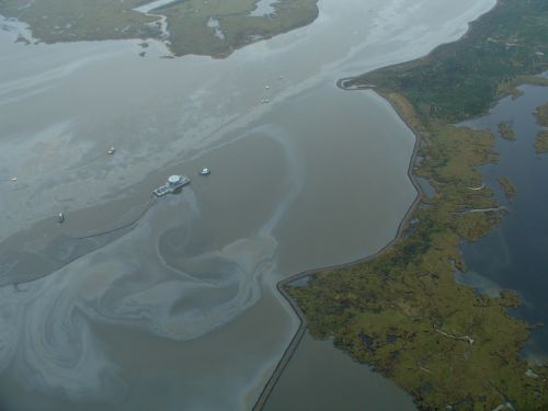Well blowout resulting in an oil spill in Lake Perot.