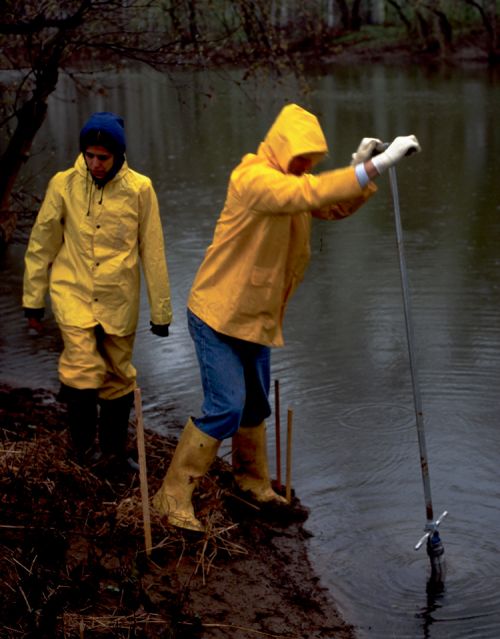 Scientists sampling sediments at Federal Creosote Superfund site.