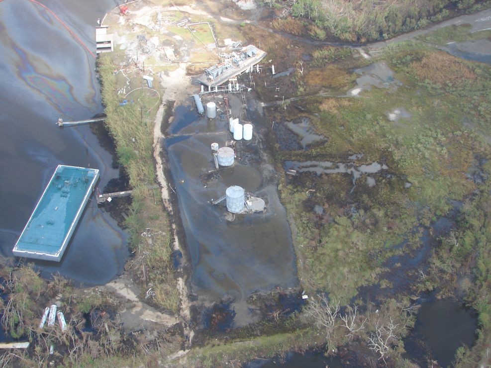 Aerial view of damaged energy facility.