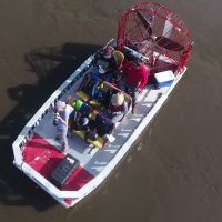 Aerial view of people in a boat