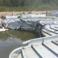 Close-up view of damaged barge.