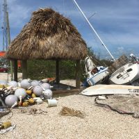 Marine debris and a vessel on a dock.