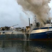 Smoking coming from a vessel. 
