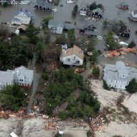 Image of damaged coastal homes in the wake of Hurricane Sandy.