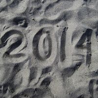 2014 written in the sand.