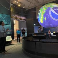 The Science on a Sphere exhibit playing two new videos focused on marine debris at the Smithsonian National Museum of Natural History World Ocean Day event (Credit: NOAA).