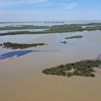 An overflight displays the affected area of marsh environment near Garden Island Bay, Louisiana on April 27, 2025. A safety zone has been enacted in the area and boom has been placed to contain the released product. Image credit: U.S. Coast Guard.