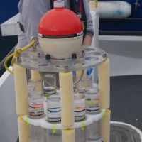 A floating research device loaded with early stage fish.