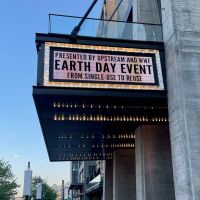 An event sign that says "Earth Day Event."