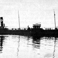 A black and white photo of a sinking vessel.