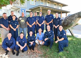 Maui Wildfire Lahaina Harbor Mission Assignment response staff from USCG, NOAA, and Global Diving and Salvage at the NOAA Hawaiian Humpback Whale National Marine Sanctuary facility in Kihei, Maui. USCG Mission Incident Commander, Capt. Melanie Burnham, front right; NOAA ERD Scientific Support Coordinator for the Pacific Islands, Ruth Yender, front row, third from right (Image credit: USCG).