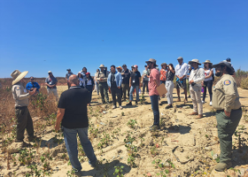 Marine Debris Leadership Academy participants visit a trash hotspot in Tijuana, Mexico to discuss its implications throughout the watershed. 