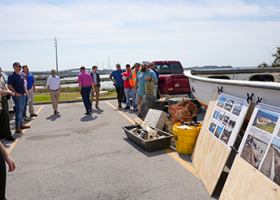 NOAA MDP Southeast Regional Coordinator, Caroline Morris and partners at a site visit on derelict vessel.