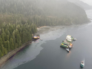 The tug Western Mariner aground with the freight barge it was towing in Neva Strait, Alaska. Image credit: Alaska Department of Fish and Game