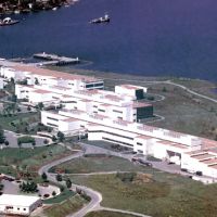 Building complex along a lakefront.