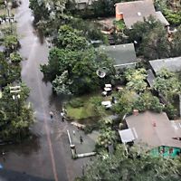 overhead view of a neighborhood after a flood.