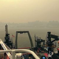 View of a hazy skyline from a vessel.