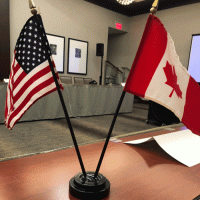 An American flag and a Canadian flag.