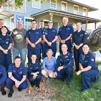 Maui Wildfire Lahaina Harbor Mission Assignment response staff from USCG, NOAA, and Global Diving and Salvage at the NOAA Hawaiian Humpback Whale National Marine Sanctuary facility in Kihei, Maui. USCG Mission Incident Commander, Capt. Melanie Burnham, front right; NOAA ERD Scientific Support Coordinator for the Pacific Islands, Ruth Yender, front row, third from right (Image credit: USCG).