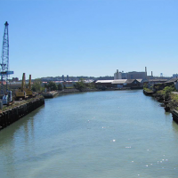 A view of the Gowanus Canal in New York as it flows under the Gowanus Expressway.