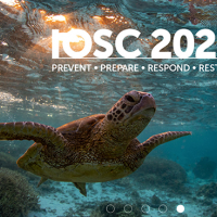 International Oil Spill Conference 2024 poster featuring a turtle swimming underwater. 