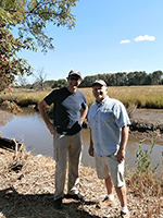 Carl Alderson (left, NOAA) and Greg Remaud (right, NY/NJ Baykeeper) on the banks of the Woodbridge River.